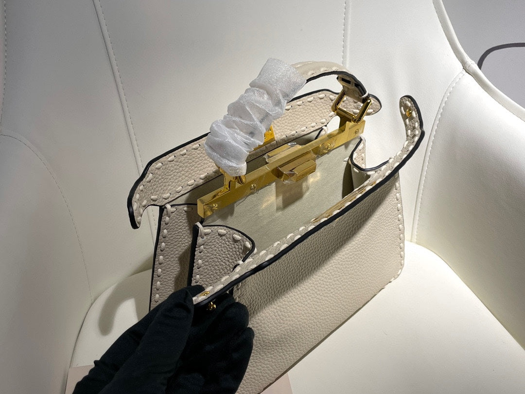 Elegant White Leather Top Handle Crossbody Bag with Gold-Tone Hardware