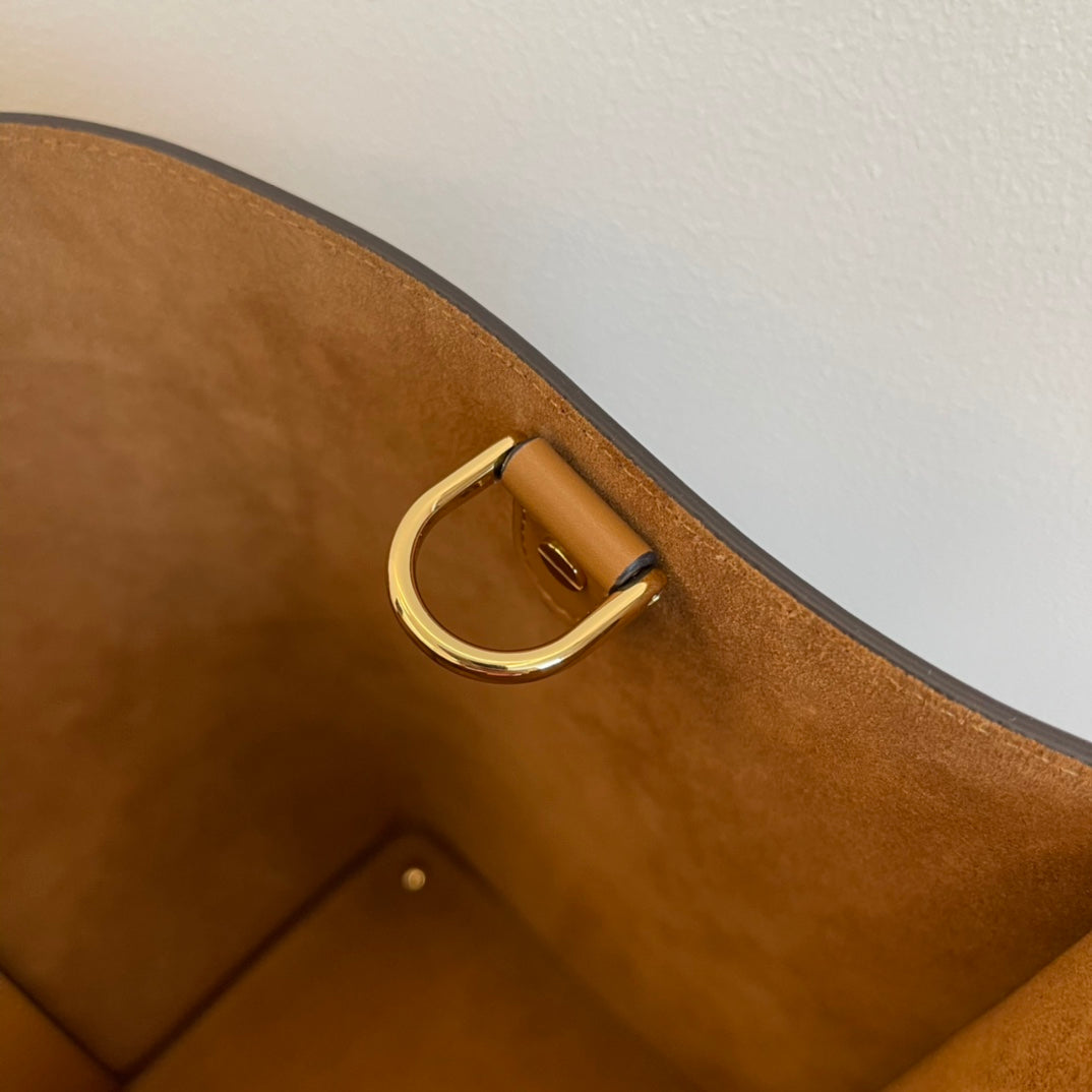 Tan Leather Tote Bag with Gold-Toned Geometric Metal Handle and Detachable Strap