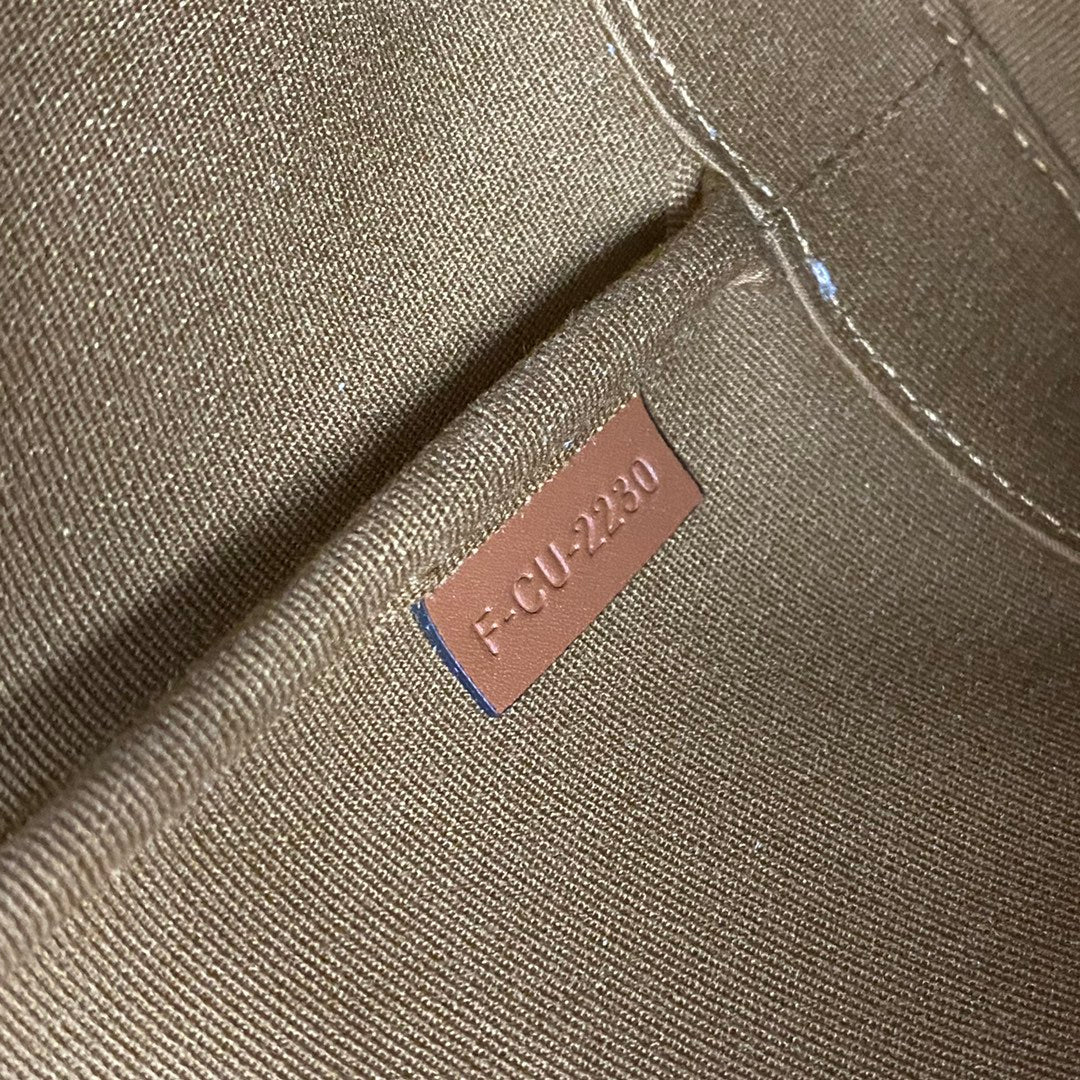 Celine Small Bucket Bag in Triomphe Canvas and Calfskin - Tan