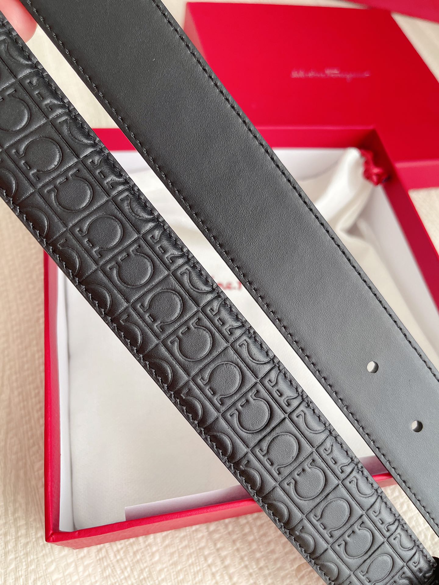 Salvatore Ferragamo Gancini Reversible Leather Belt in Black with Embossed Logo and Silver-Tone Buckle, Includes Gift Packaging