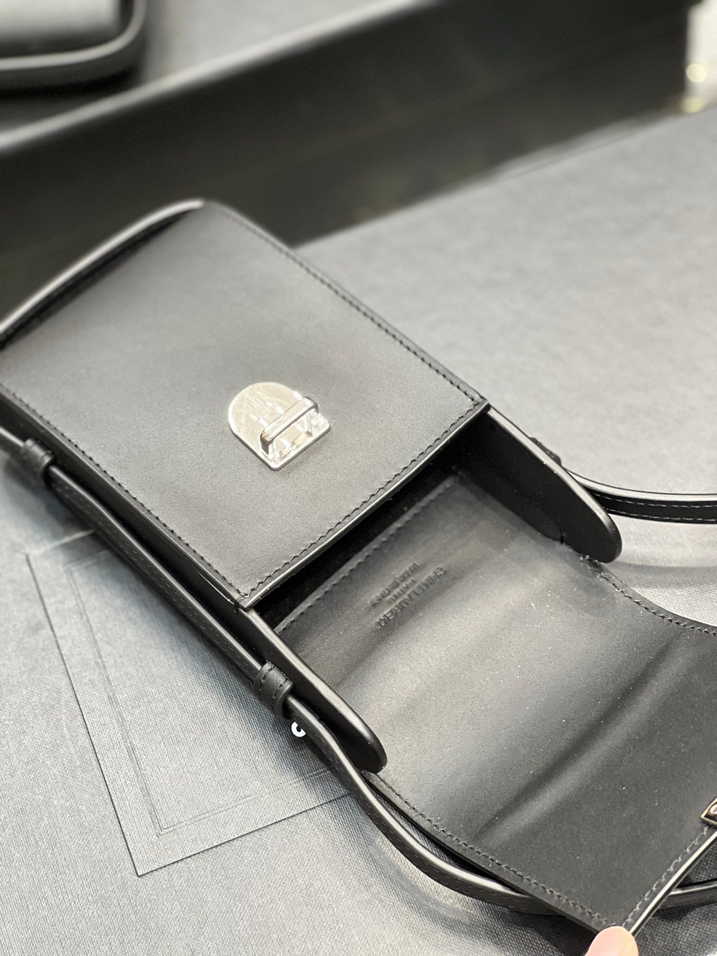 Saint Laurent Black Leather Phone Pouch Crossbody Bag with Silver Clasp