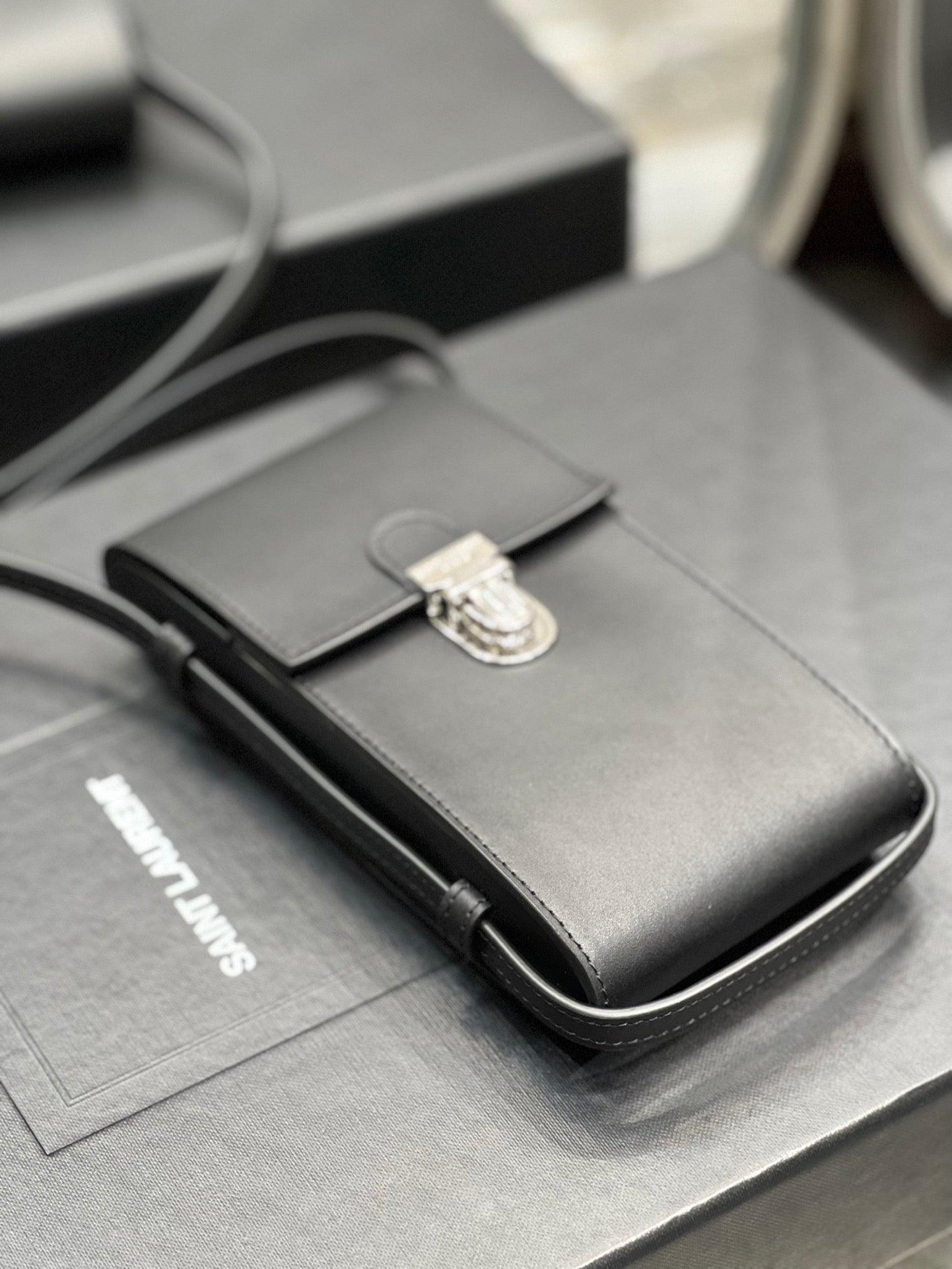 Saint Laurent Black Leather Phone Pouch Crossbody Bag with Silver Clasp