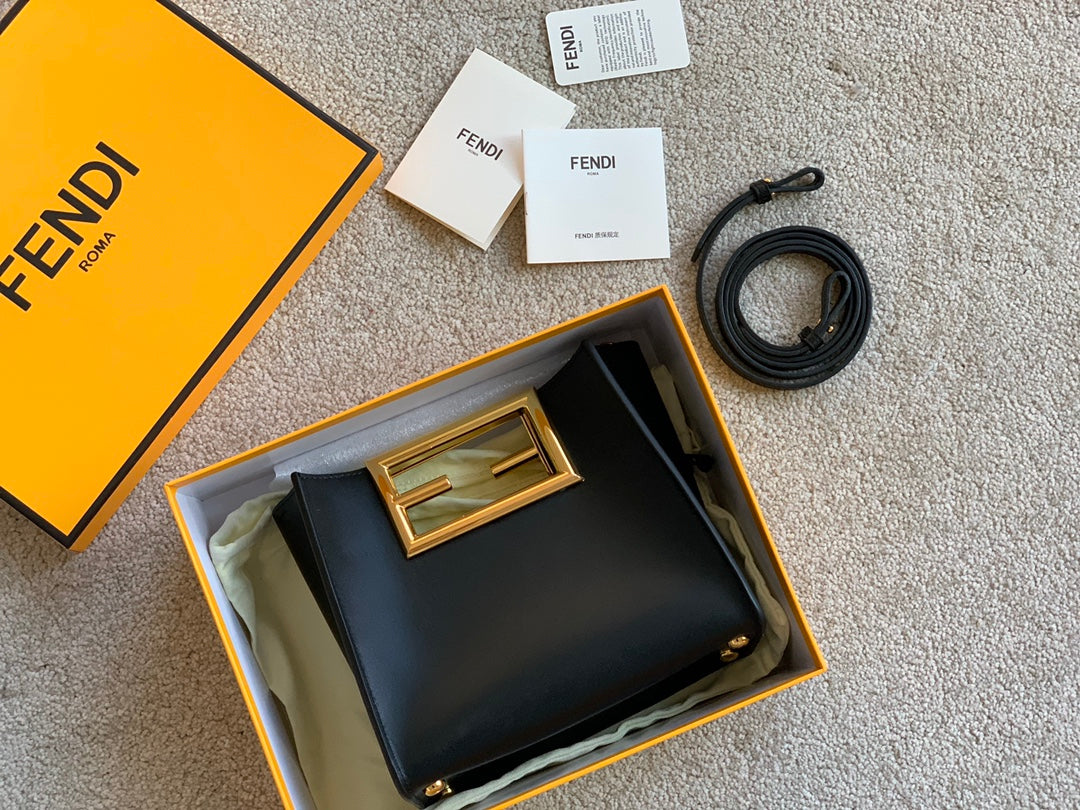 Fendi First Small Black Leather Clutch Bag with Gold-Finish Metal Handle