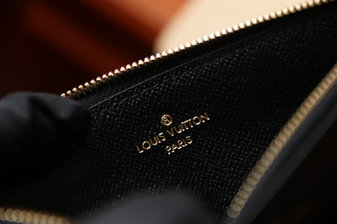 Louis Vuitton Slim Purse Monogram Canvas with Black Leather Trim