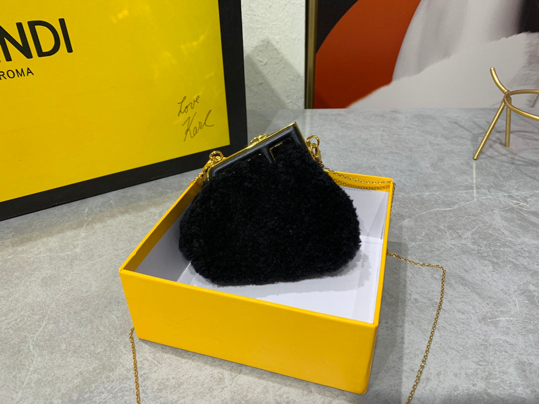 Fendi First Nano Black Shearling Mini Bag with Gold Chain
