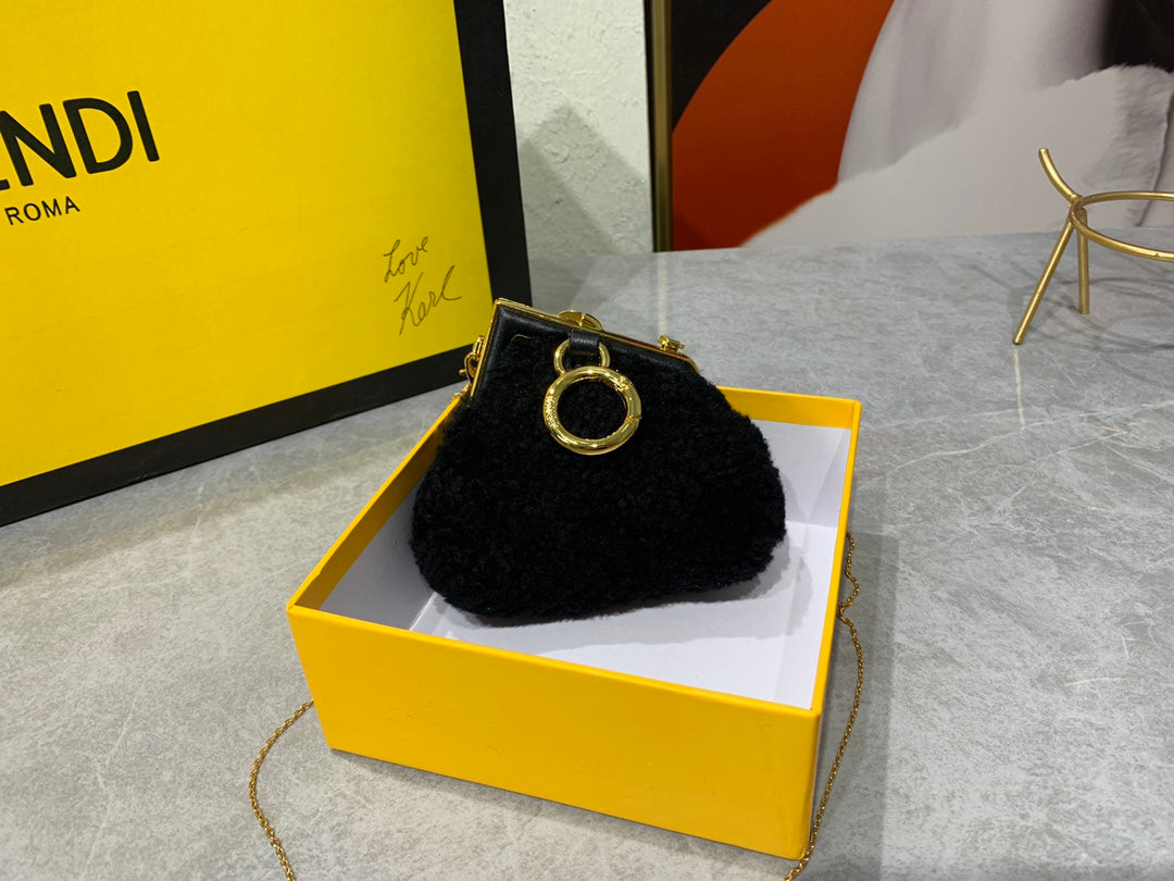 Fendi First Nano Black Shearling Mini Bag with Gold Chain