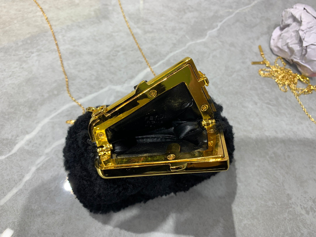 Fendi First Nano Black Shearling Mini Bag with Gold Chain