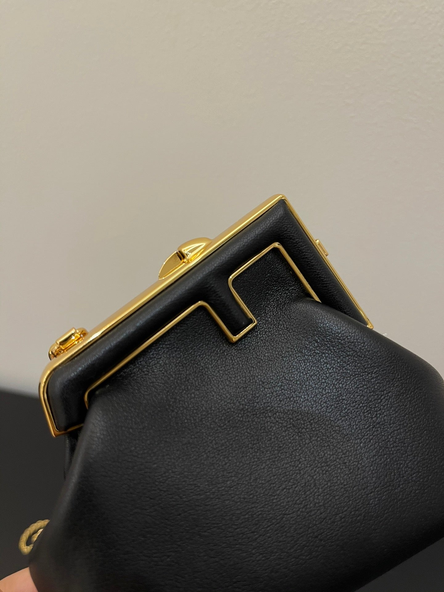 Fendi First Nano Black Nappa Leather Bag with Gold Chain Strap