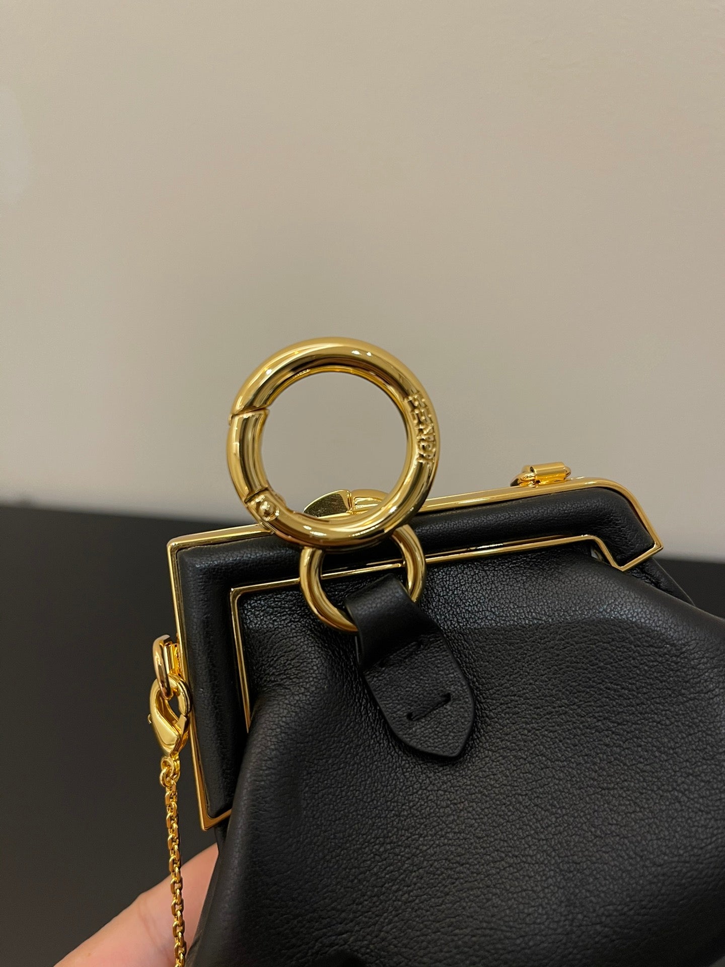 Fendi First Nano Black Nappa Leather Bag with Gold Chain Strap