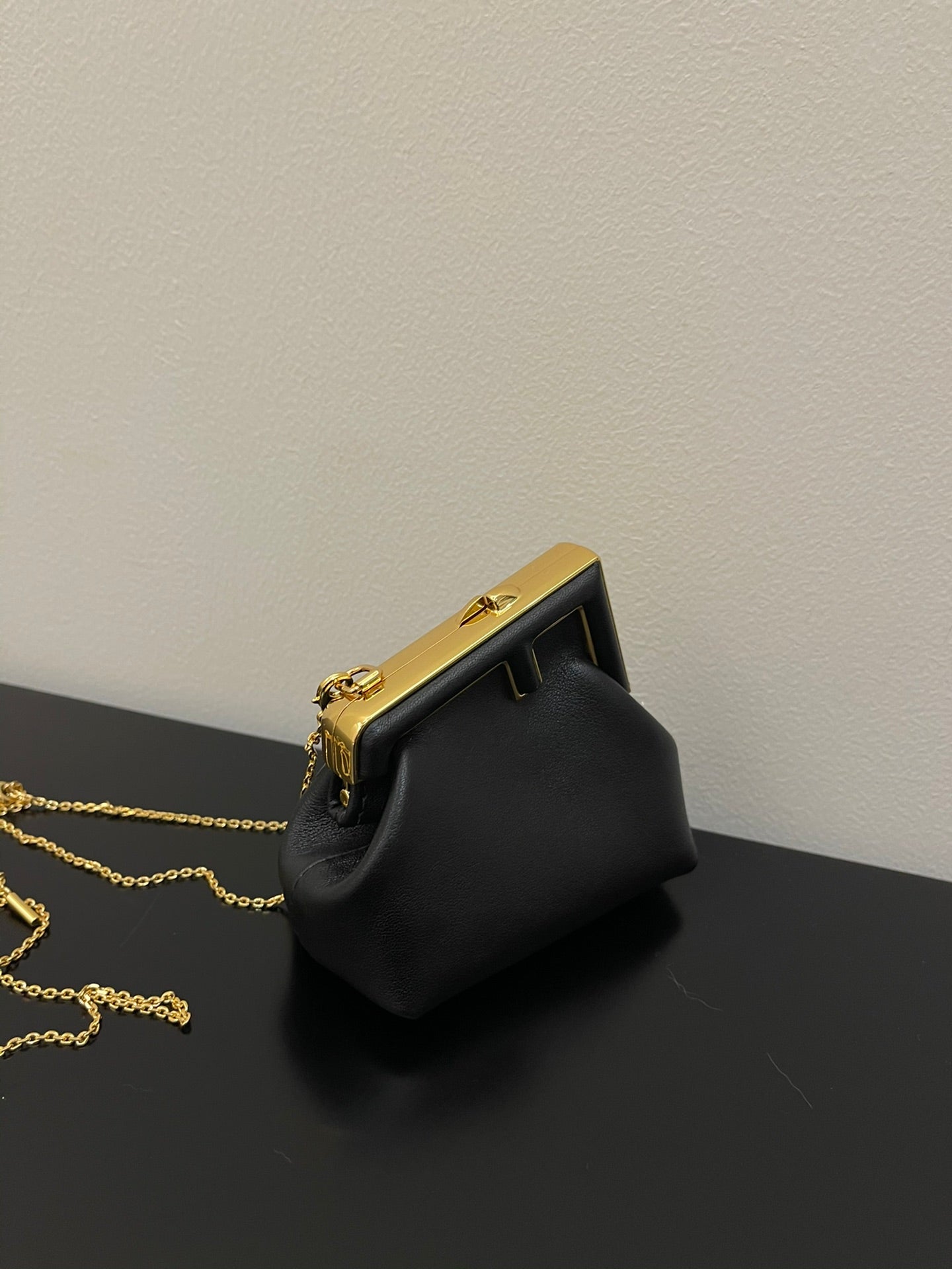 Fendi First Nano Black Nappa Leather Bag with Gold Chain Strap