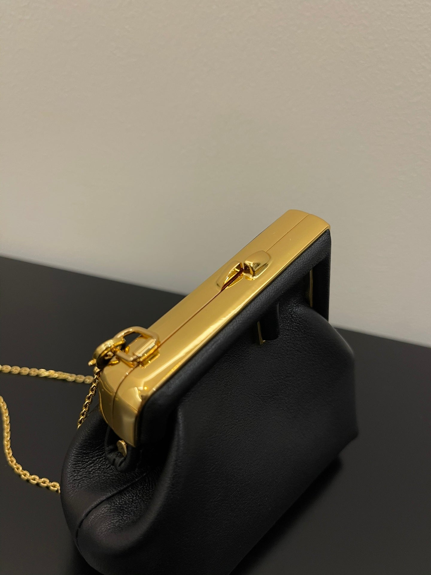 Fendi First Nano Black Nappa Leather Bag with Gold Chain Strap