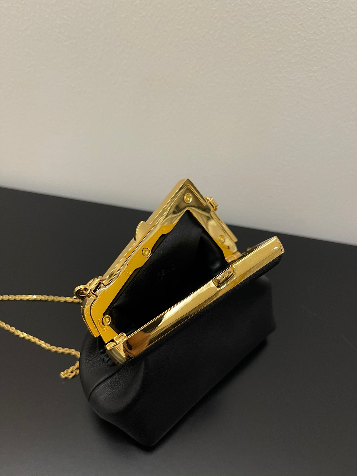 Fendi First Nano Black Nappa Leather Bag with Gold Chain Strap