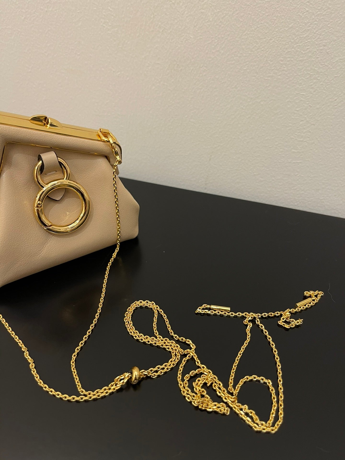Nano Beige Leather Pouch with Gold Chain Strap and Metal Frame Closure