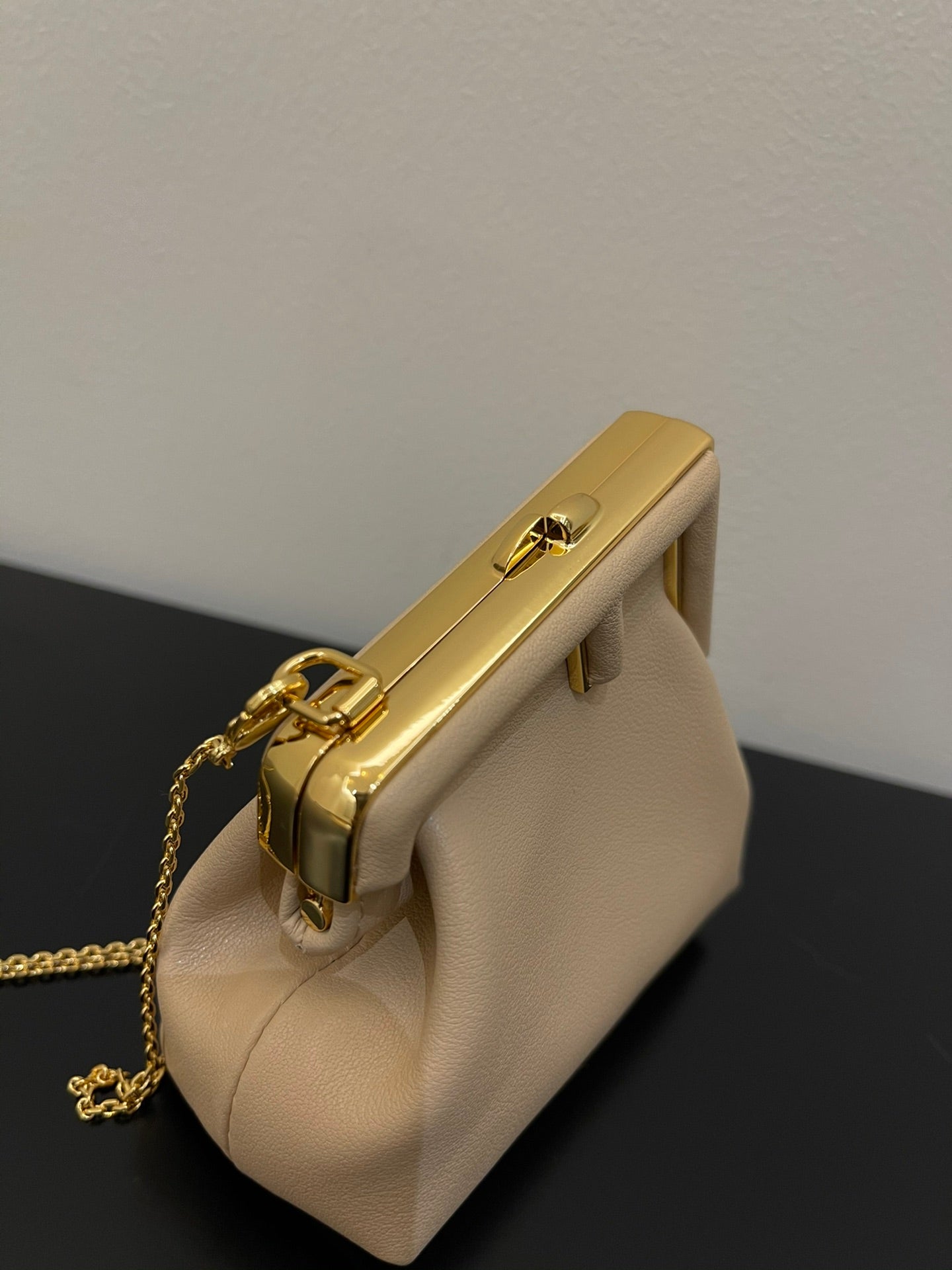 Nano Beige Leather Pouch with Gold Chain Strap and Metal Frame Closure