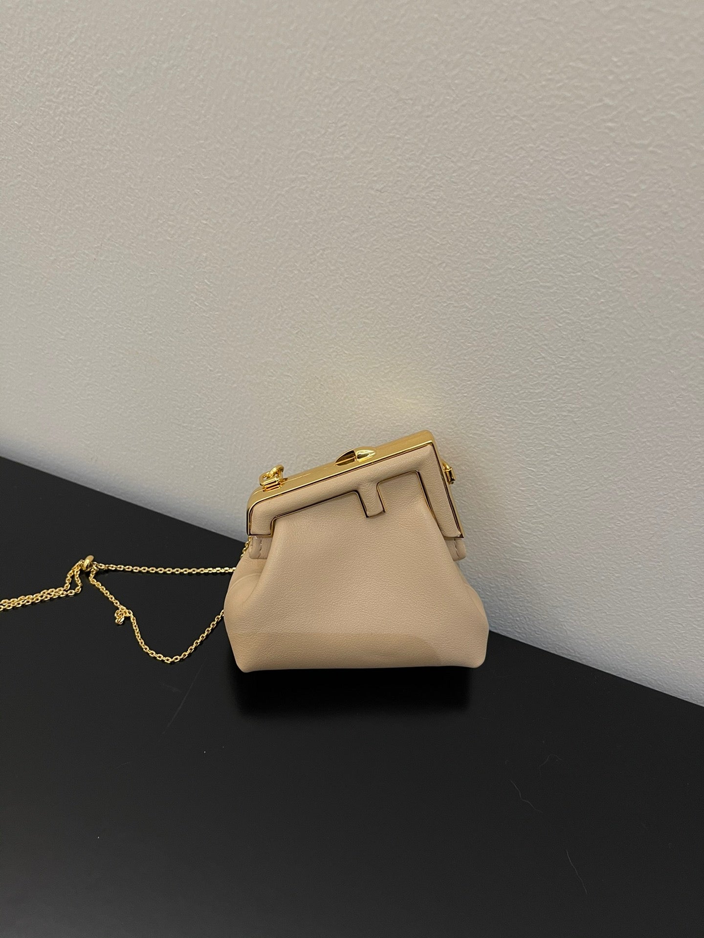 Nano Beige Leather Pouch with Gold Chain Strap and Metal Frame Closure