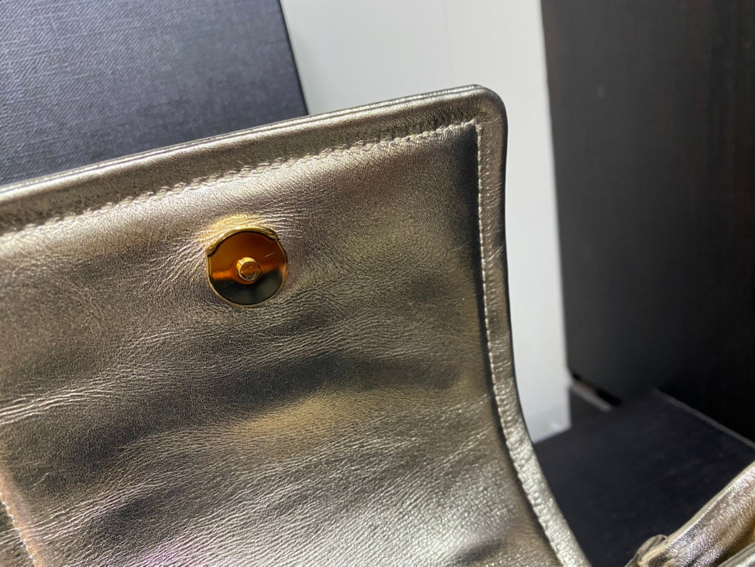 Saint Laurent Joe Mini Bucket Bag in Metallic Quilted Leather - Gold
