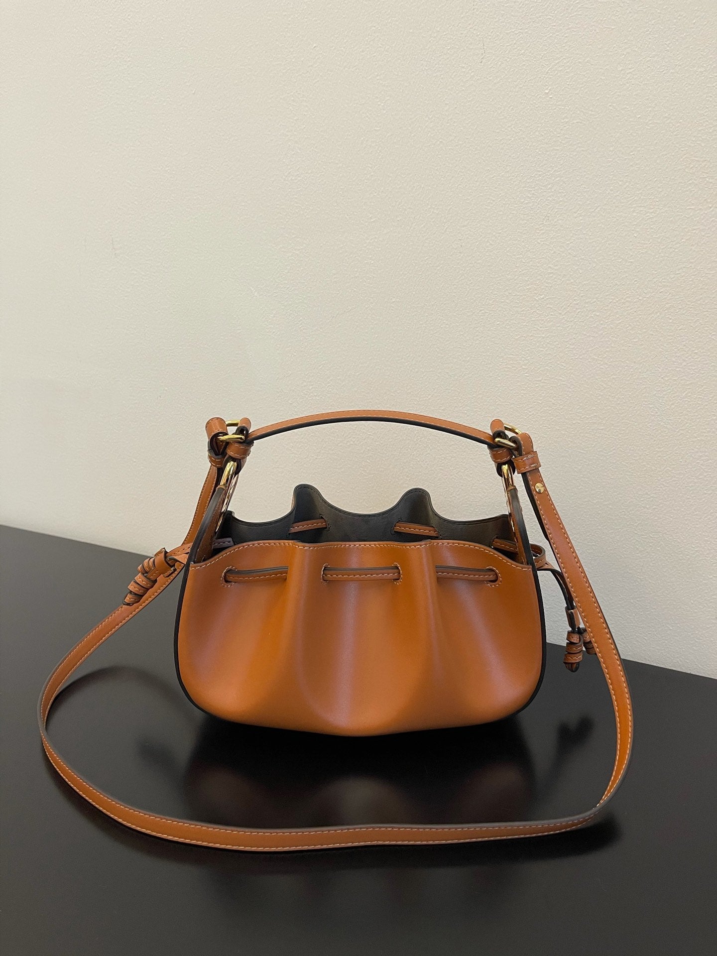 Mini Pleated Leather Drawstring Crossbody Bucket Bag - Tan