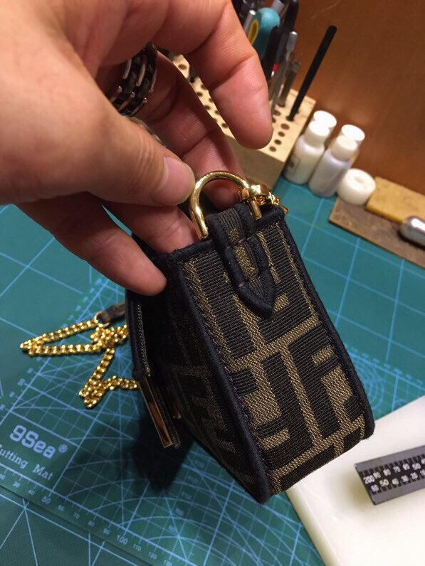 Fendi Mini Baguette Bag in Tobacco Zucca Canvas with Gold-Tone FF Buckle