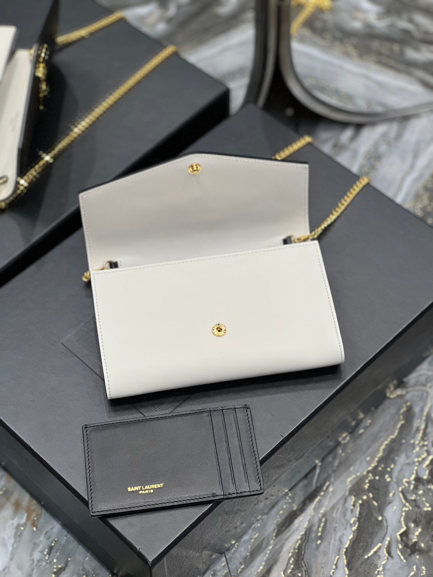 Saint Laurent Uptown Chain Wallet in Black and White Leather