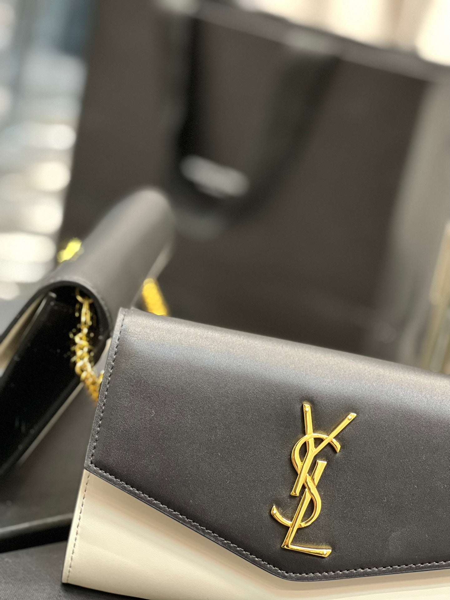 Saint Laurent Uptown Chain Wallet in Black and White Leather
