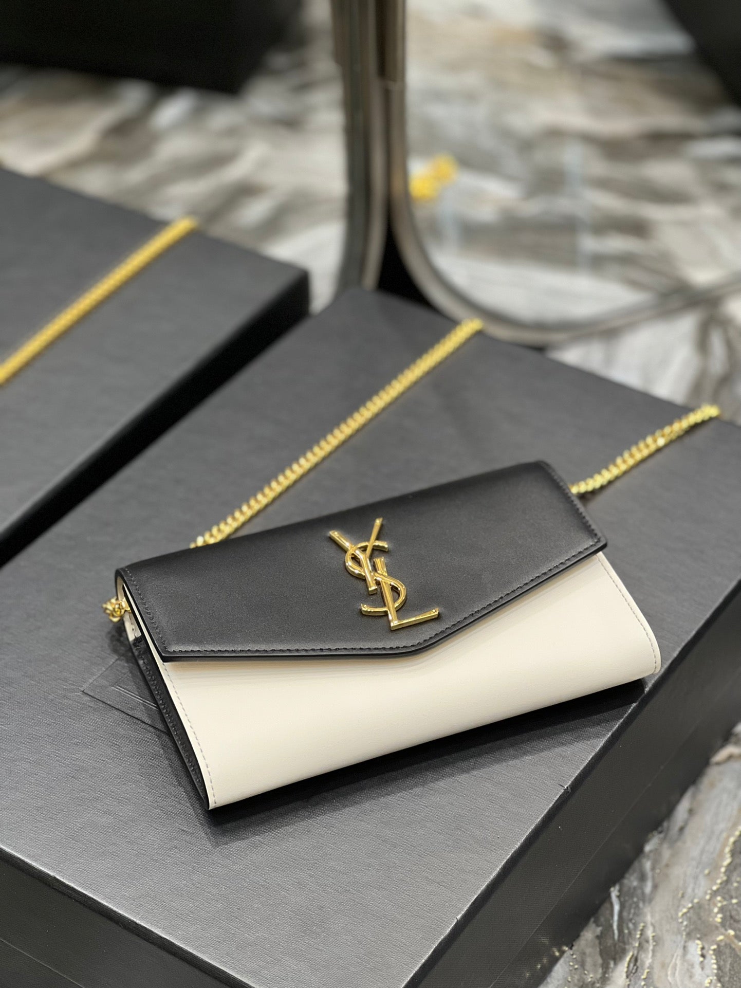 Saint Laurent Uptown Chain Wallet in Black and White Leather
