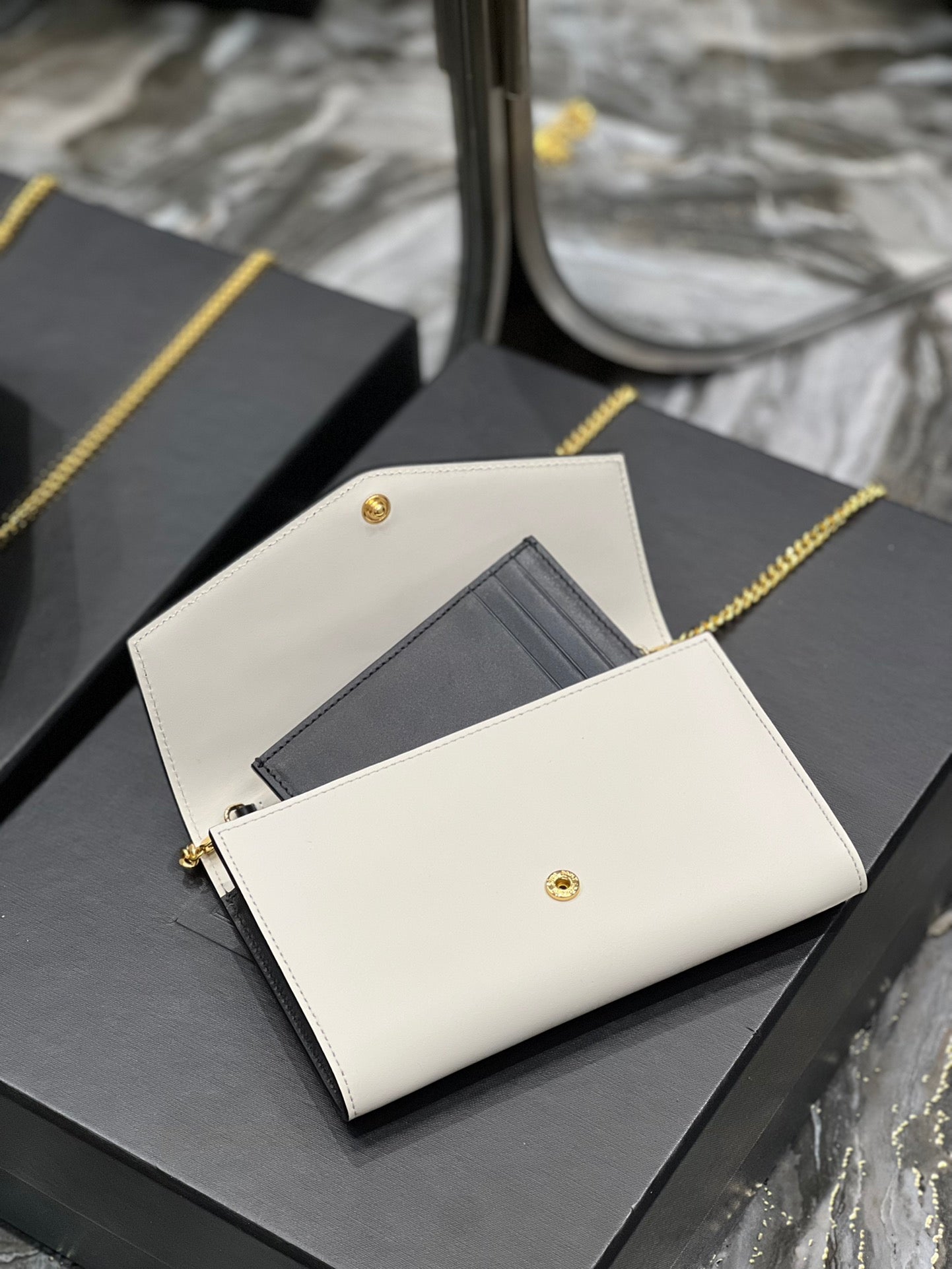 Saint Laurent Uptown Chain Wallet in Black and White Leather