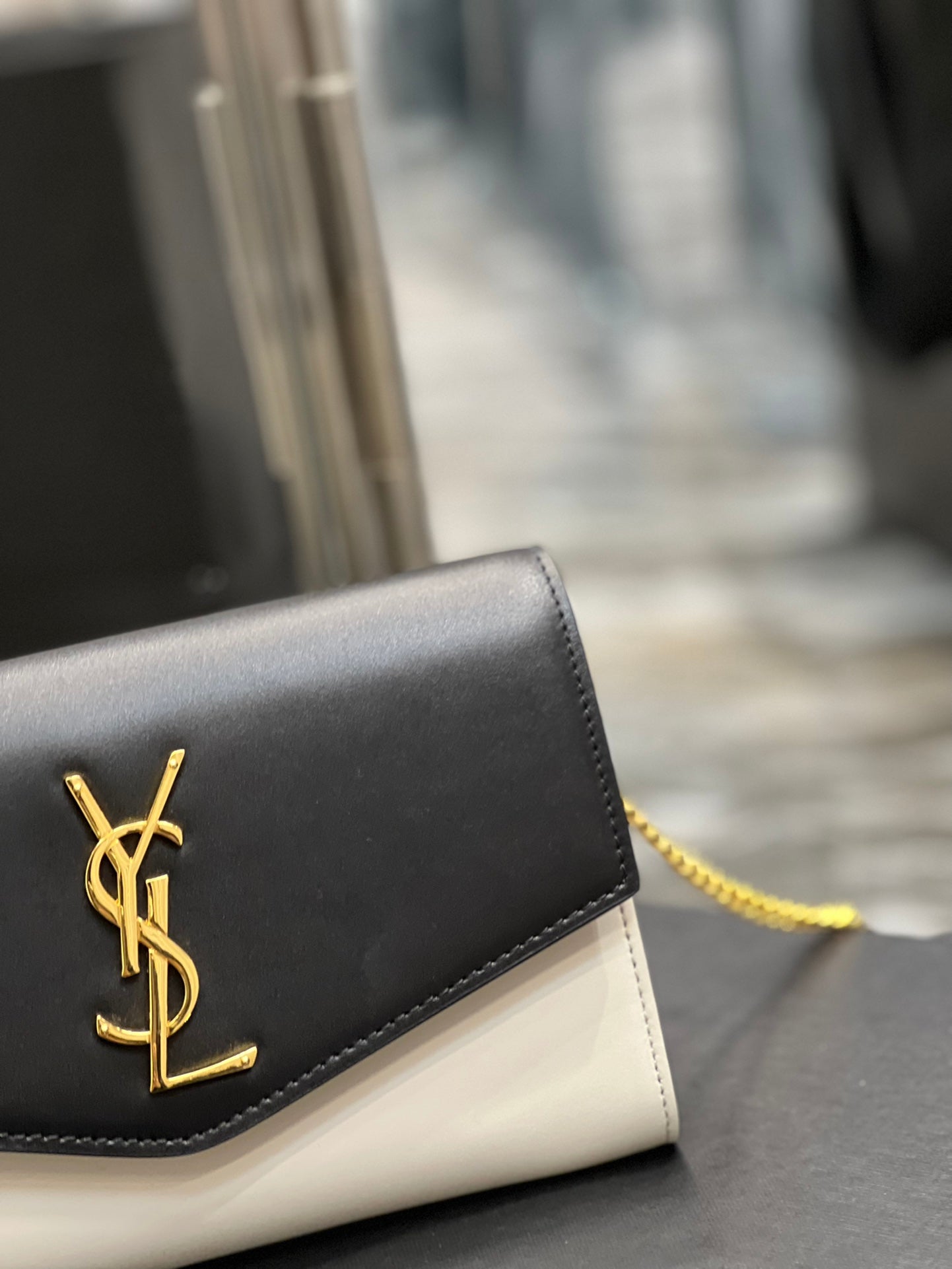Saint Laurent Uptown Chain Wallet in Black and White Leather