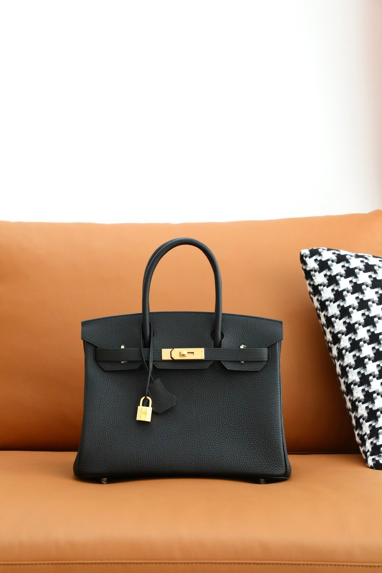 Luxury Black Leather Top Handle Handbag with Gold-Tone Hardware