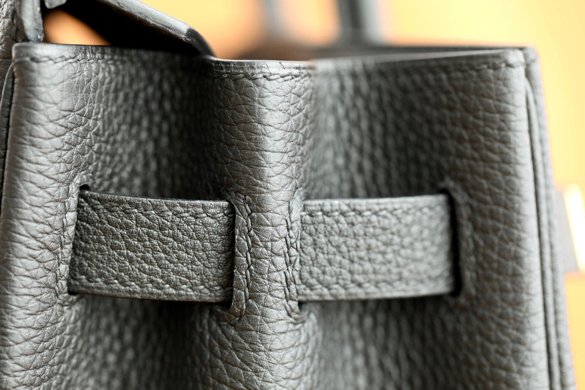 Luxury Black Leather Top Handle Handbag with Gold-Tone Hardware