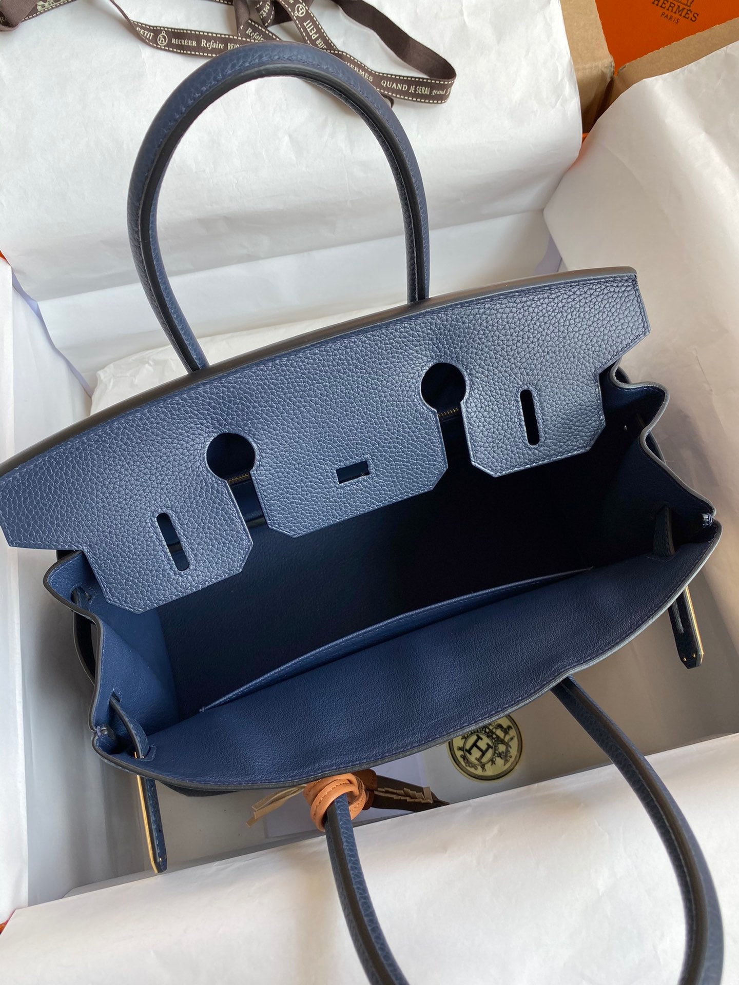 Navy Blue Leather Top-Handle Handbag with Gold Hardware and Horse Charm