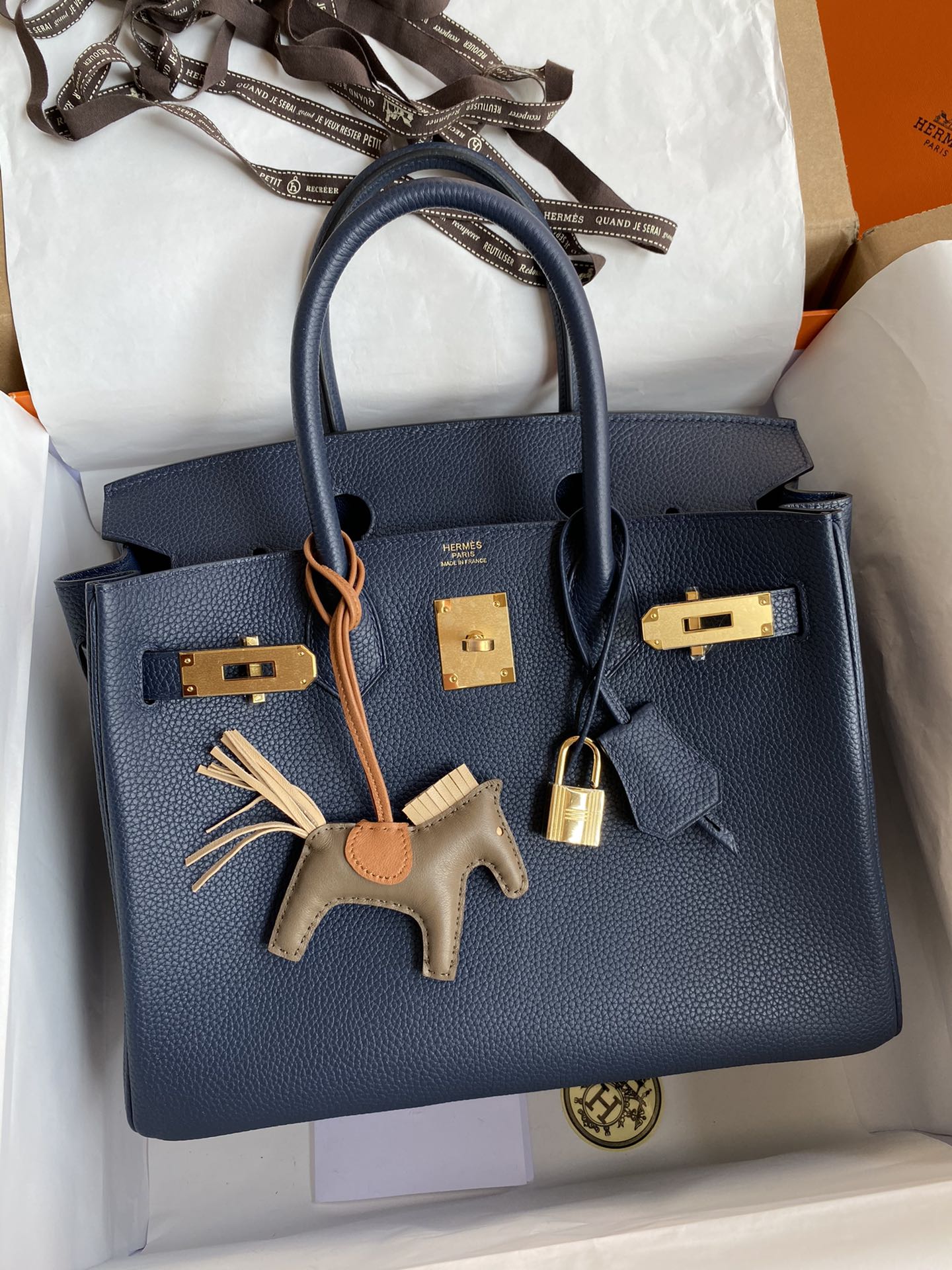Navy Blue Leather Top-Handle Handbag with Gold Hardware and Horse Charm