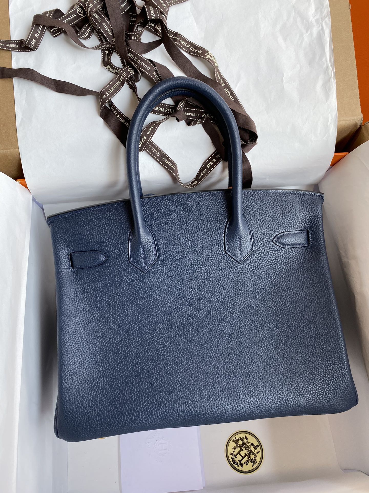 Navy Blue Leather Top-Handle Handbag with Gold Hardware and Horse Charm