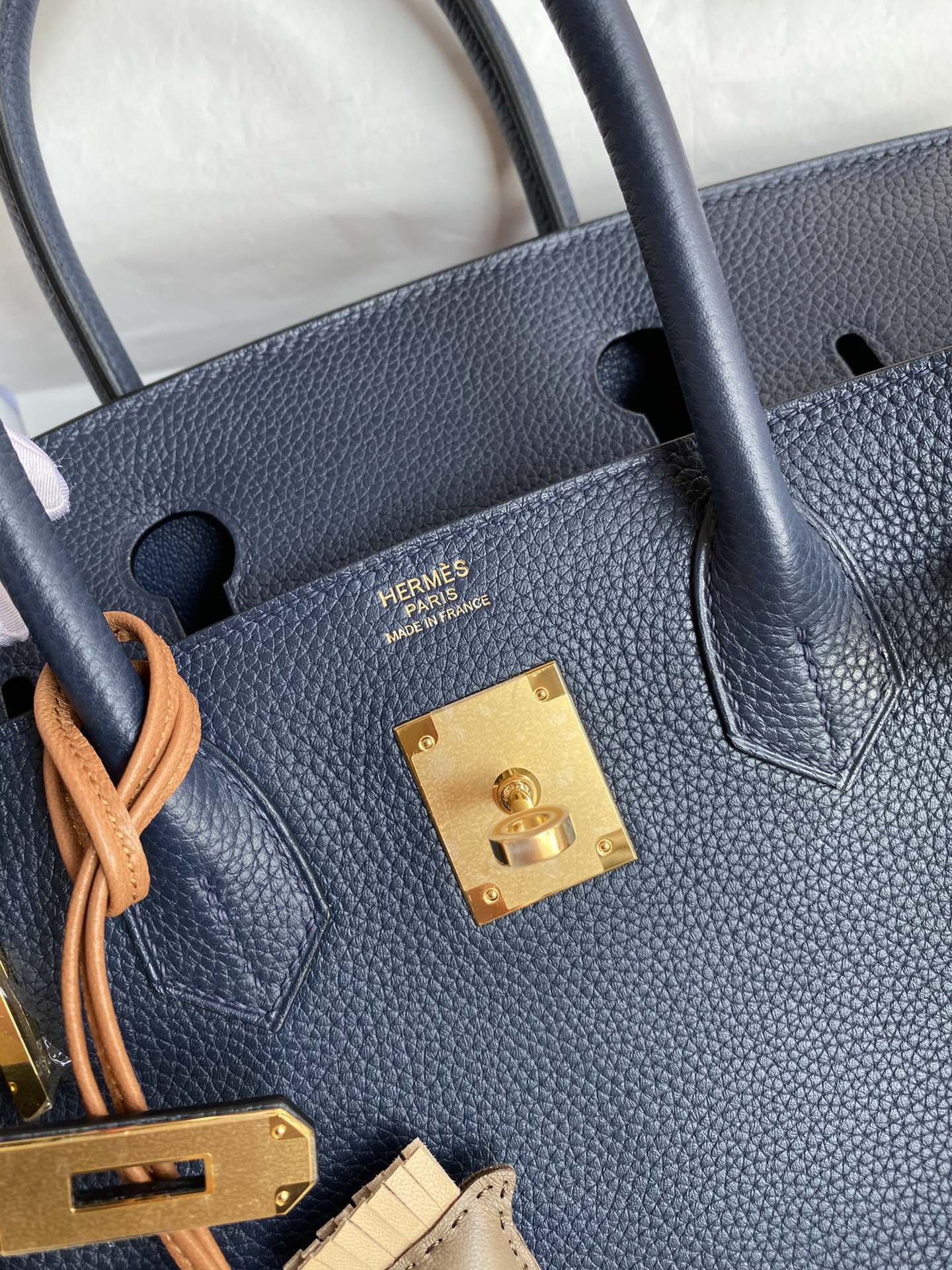 Navy Blue Leather Top-Handle Handbag with Gold Hardware and Horse Charm