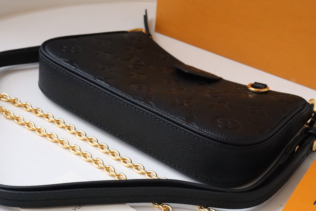 Louis Vuitton Monogram Empreinte Leather Pochette Accessoires - Black