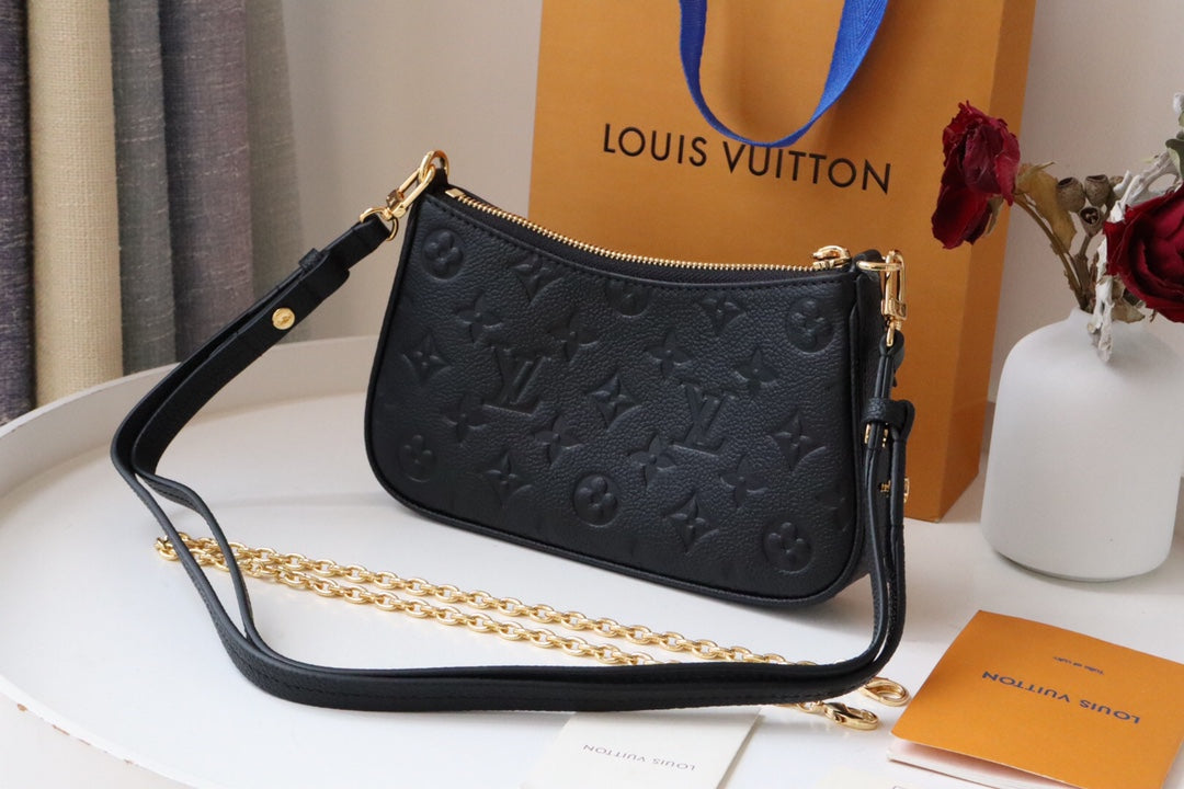 Louis Vuitton Monogram Empreinte Leather Pochette Accessoires - Black
