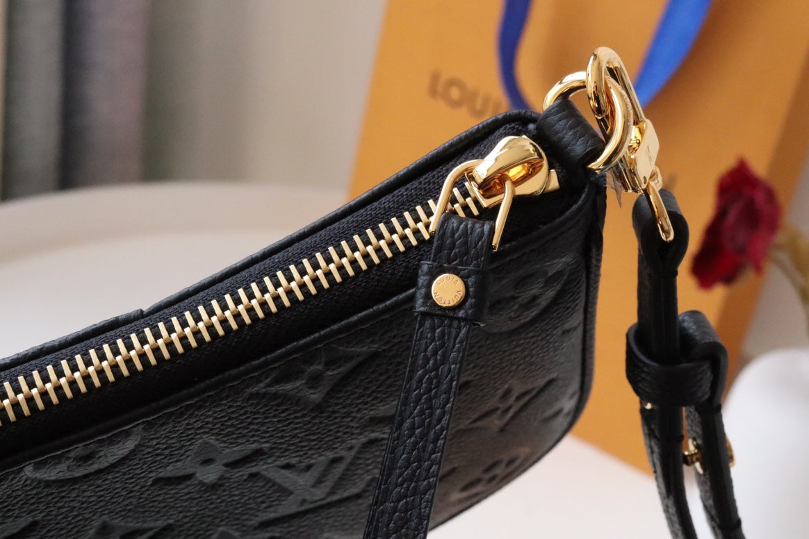 Louis Vuitton Monogram Empreinte Leather Pochette Accessoires - Black