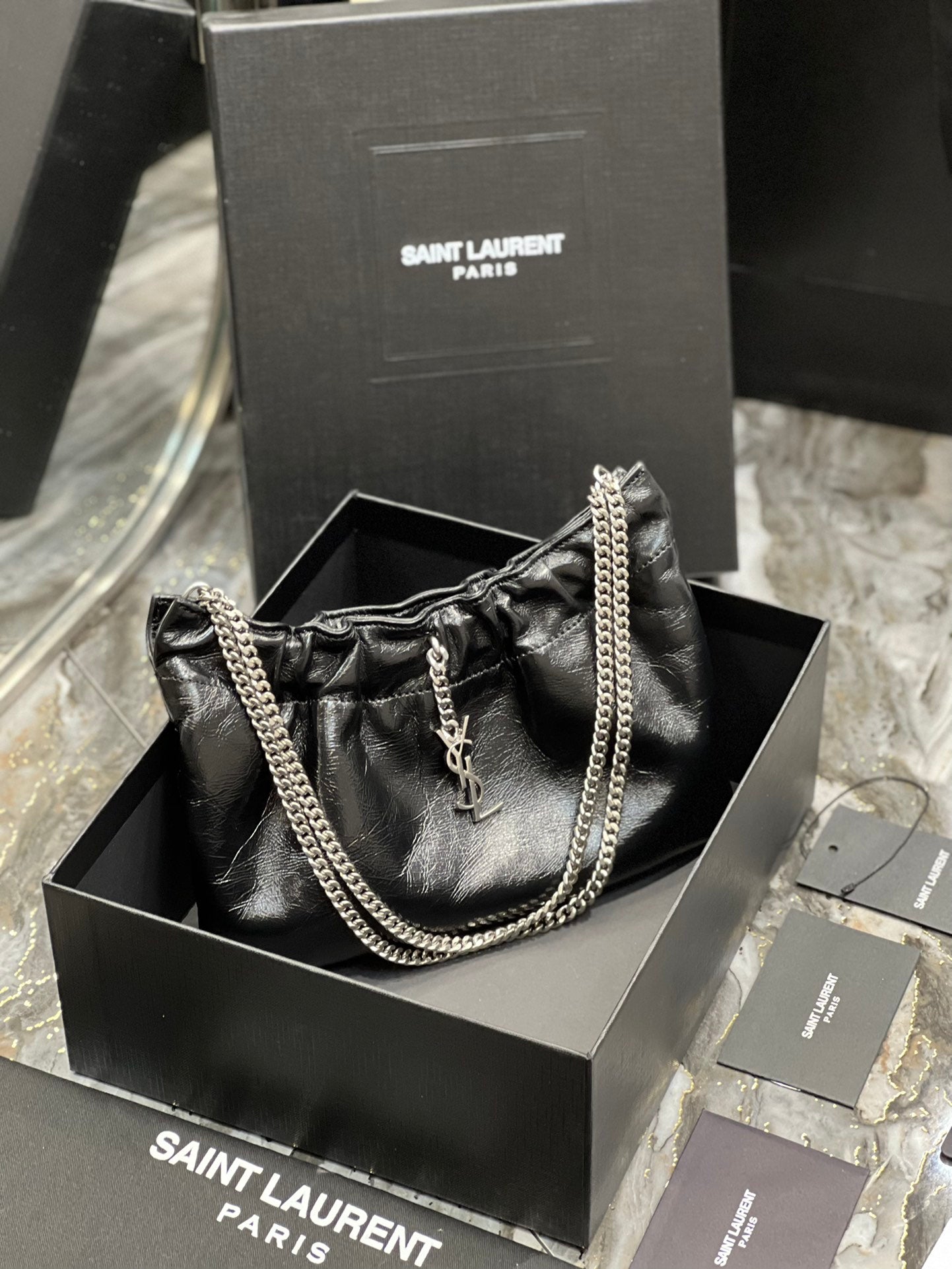 Saint Laurent Black Leather Mini Pouch Bag with Silver Chain and YSL Charm