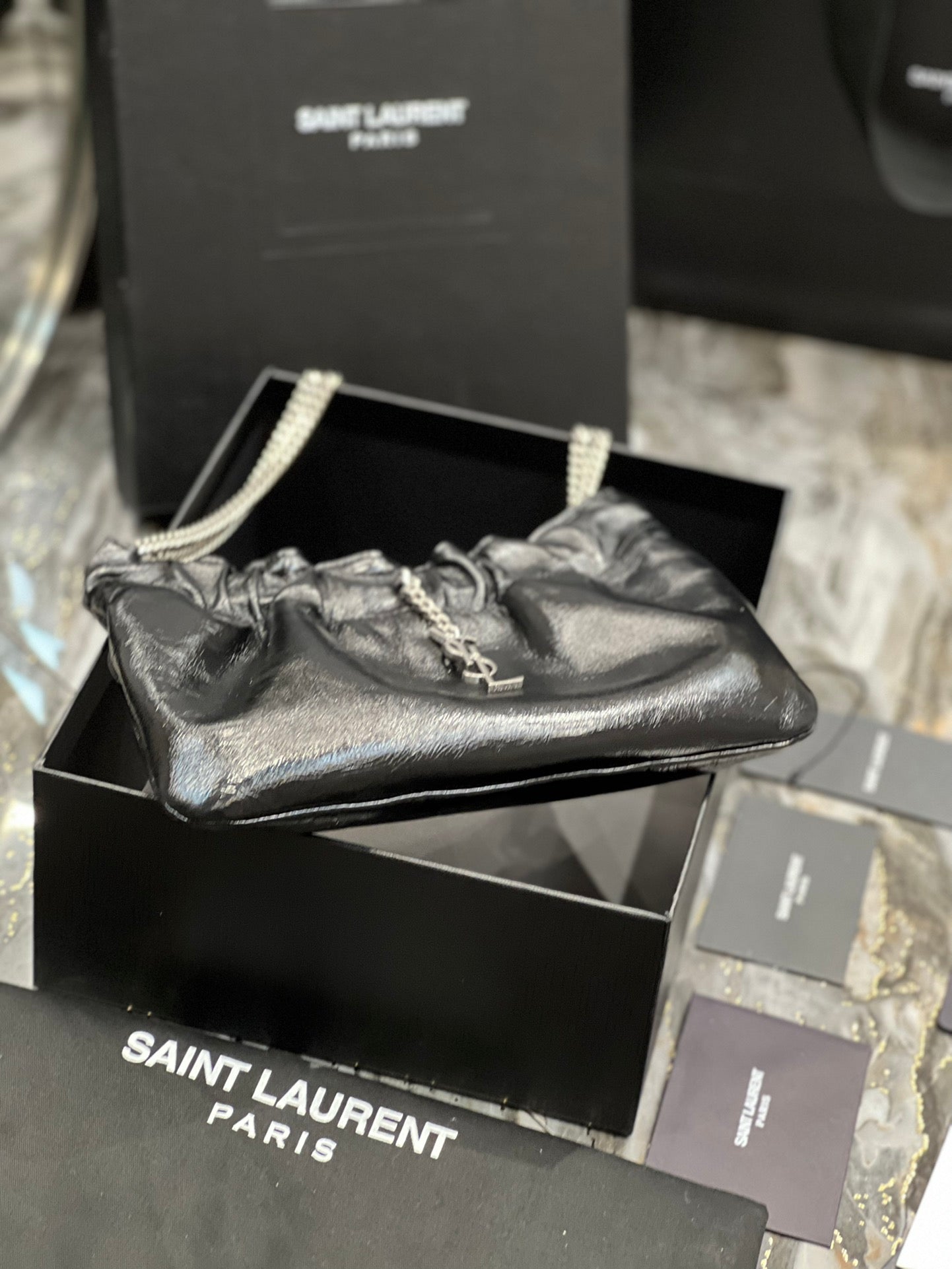 Saint Laurent Black Leather Mini Pouch Bag with Silver Chain and YSL Charm
