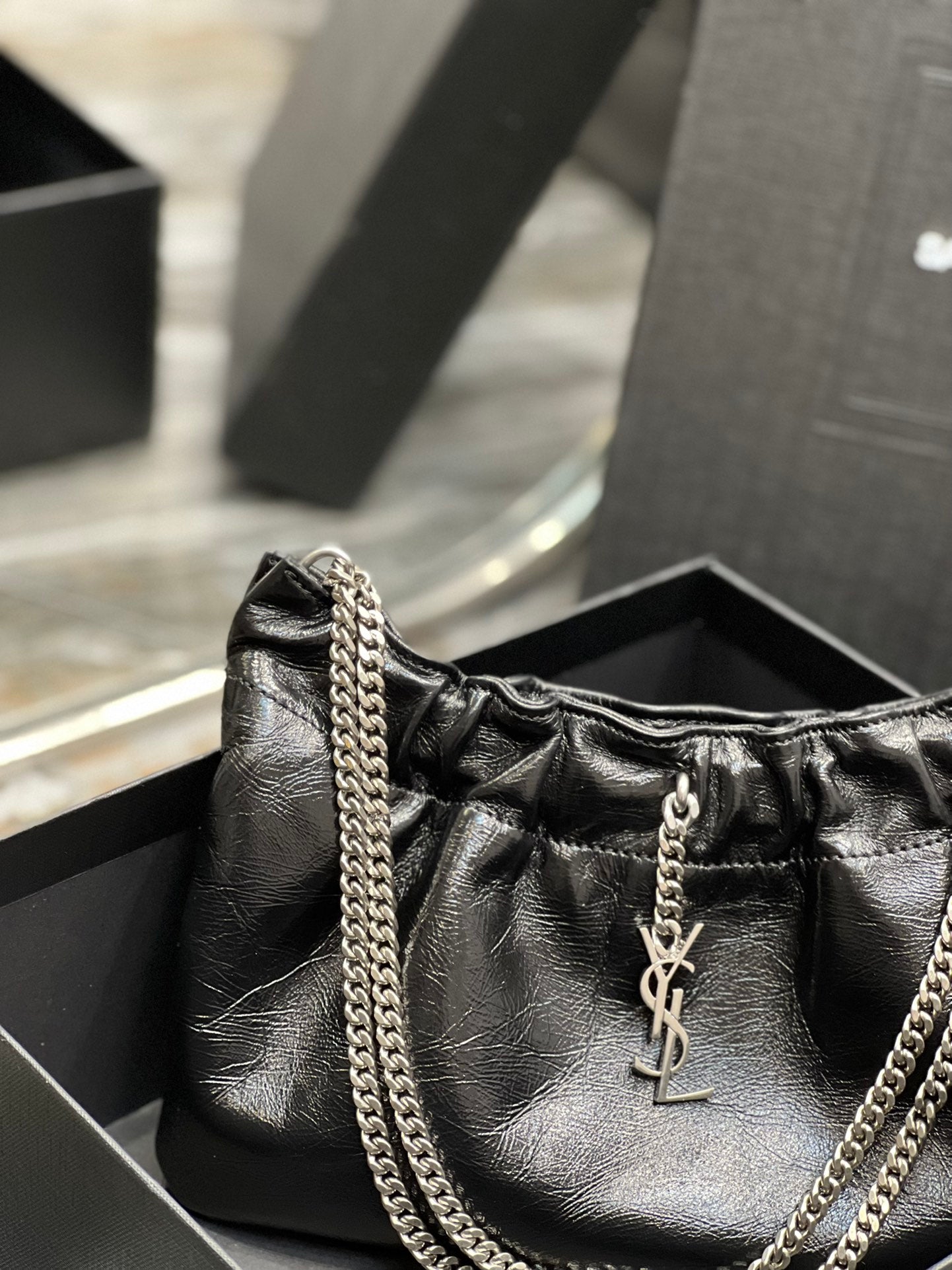 Saint Laurent Black Leather Mini Pouch Bag with Silver Chain and YSL Charm