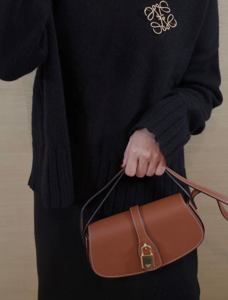 Celine Brown Leather Handbag with Gold-Tone Padlock Closure