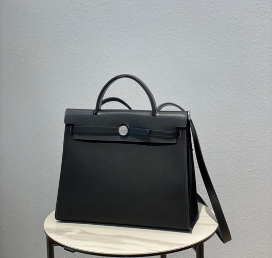 Elegant Black Structured Top-Handle Handbag - Versatile Satchel with Shoulder Strap