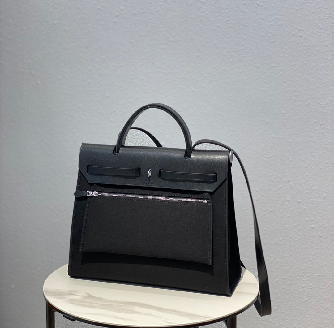 Elegant Black Structured Top-Handle Handbag - Versatile Satchel with Shoulder Strap