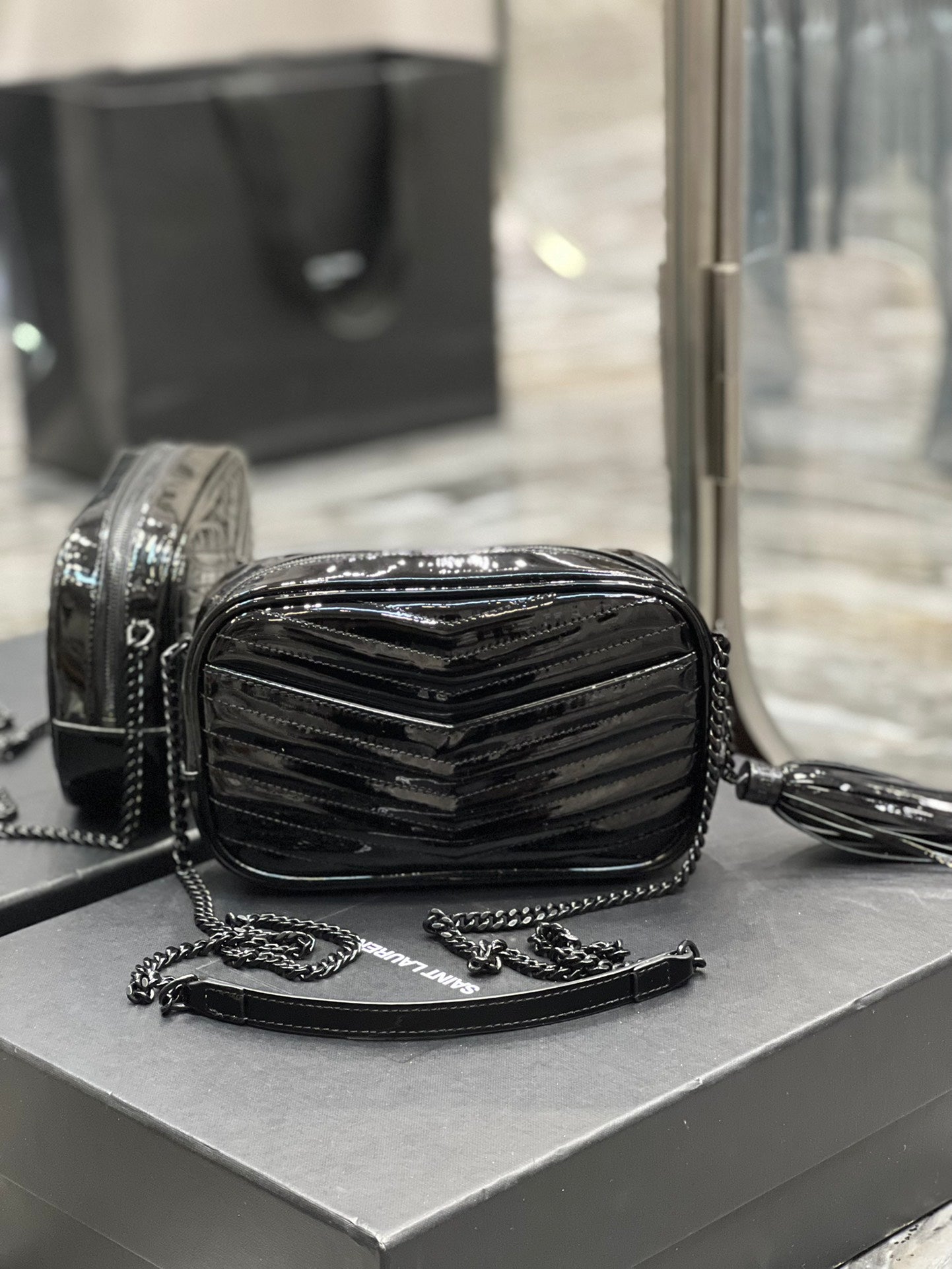Quilted Black Patent Leather Crossbody Camera Bag with Tassel and Chain Strap