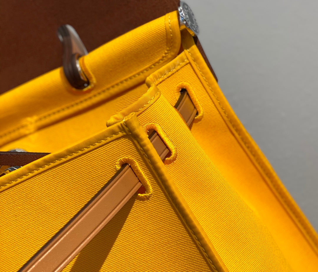 Luxury Two-Tone Yellow Canvas and Tan Leather Top Handle Shoulder Bag