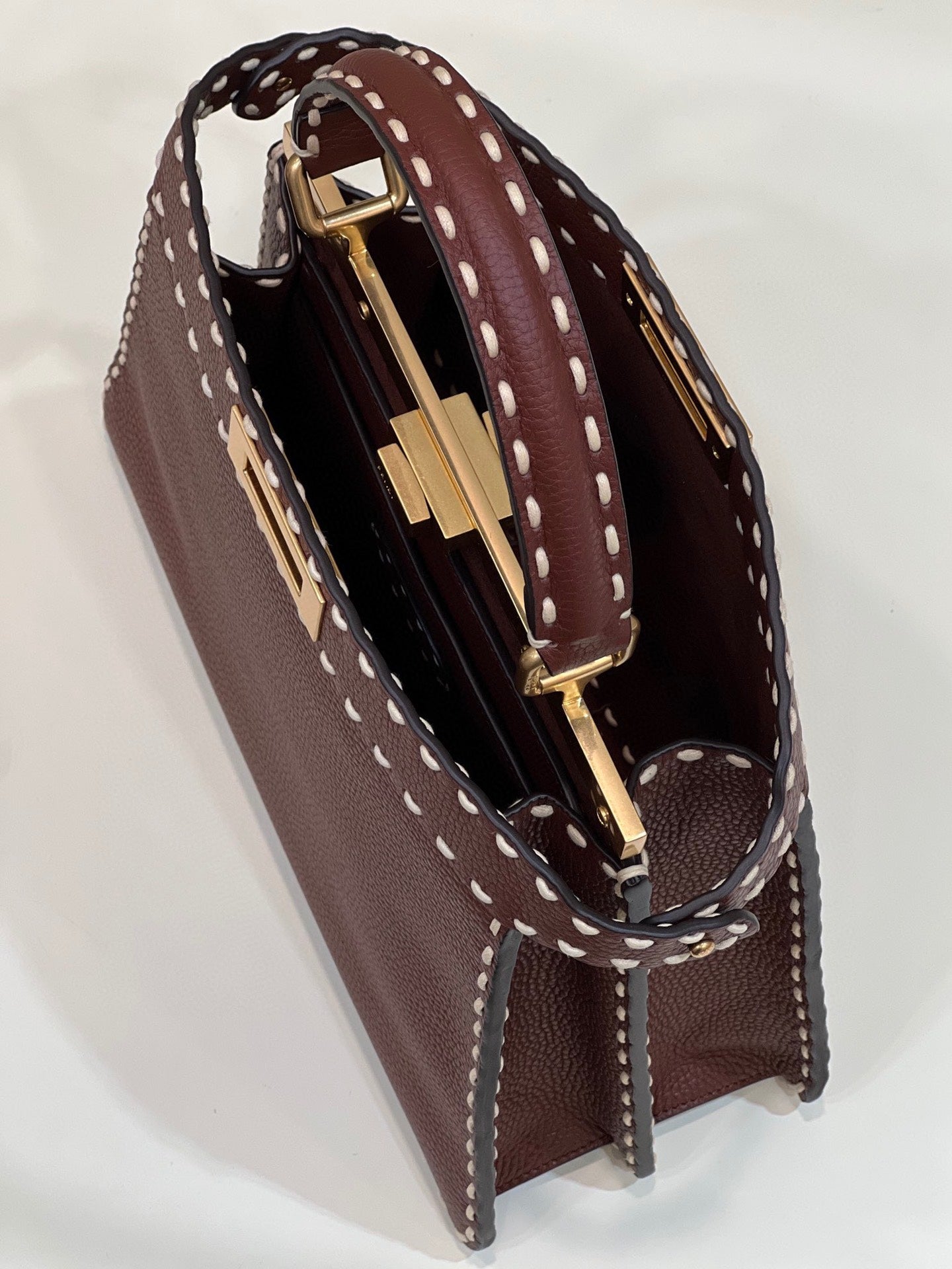Sophisticated Burgundy Top Handle Handbag with White Contrast Stitching and Matching Wallet
