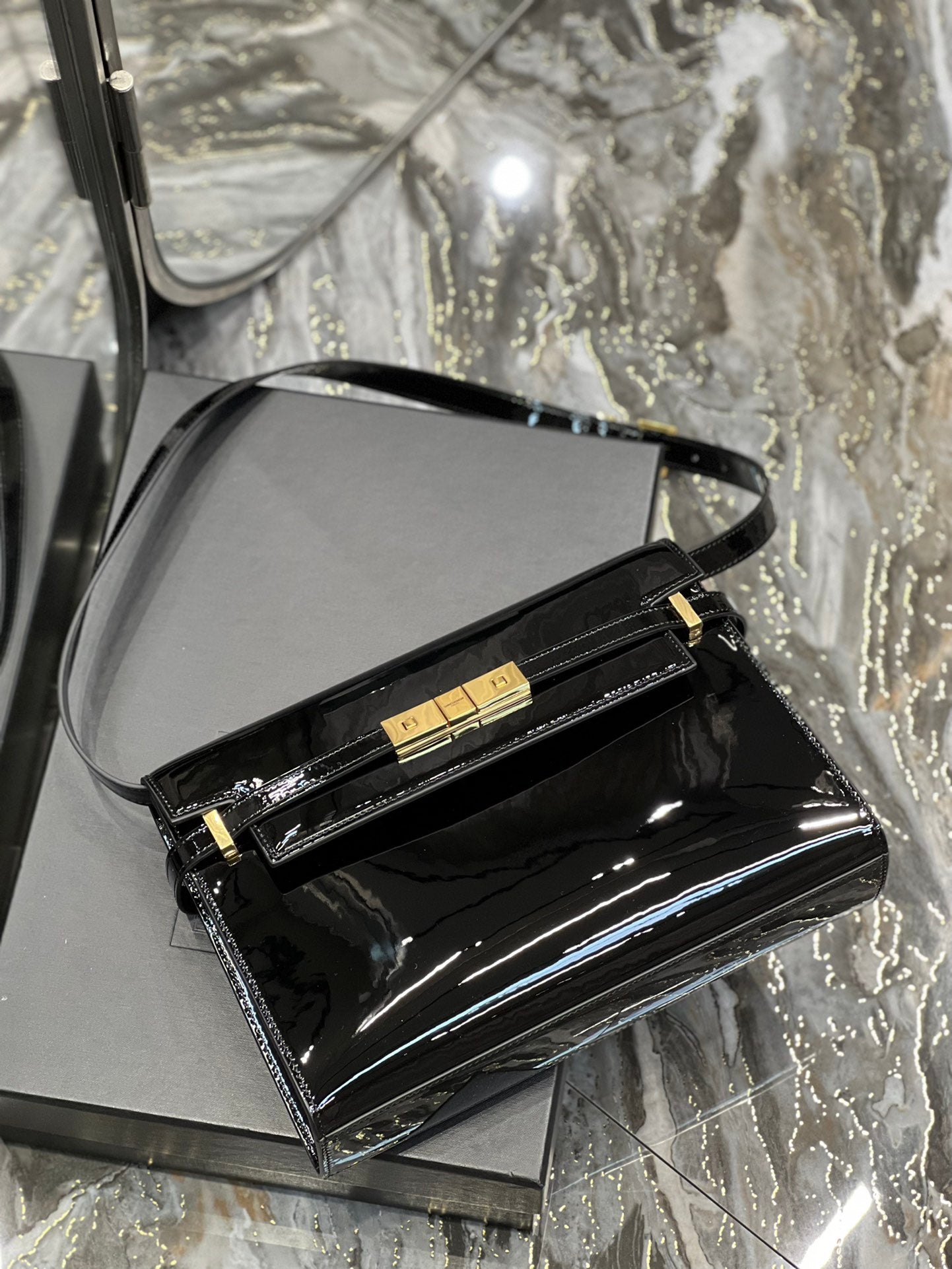 Elegant Black Patent Leather Handbag with Gold Clasp - Luxury Shoulder Bag