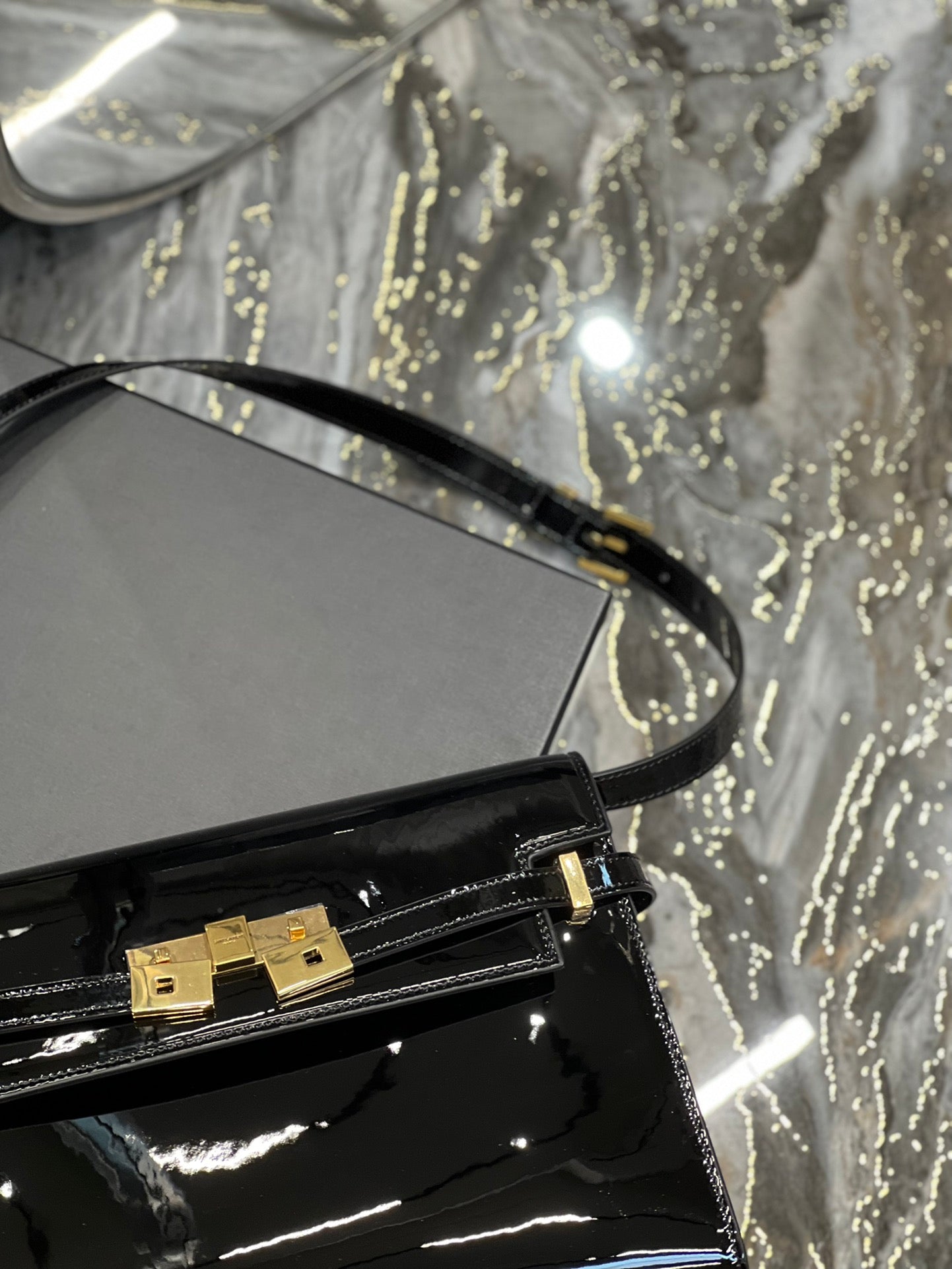 Elegant Black Patent Leather Handbag with Gold Clasp - Luxury Shoulder Bag