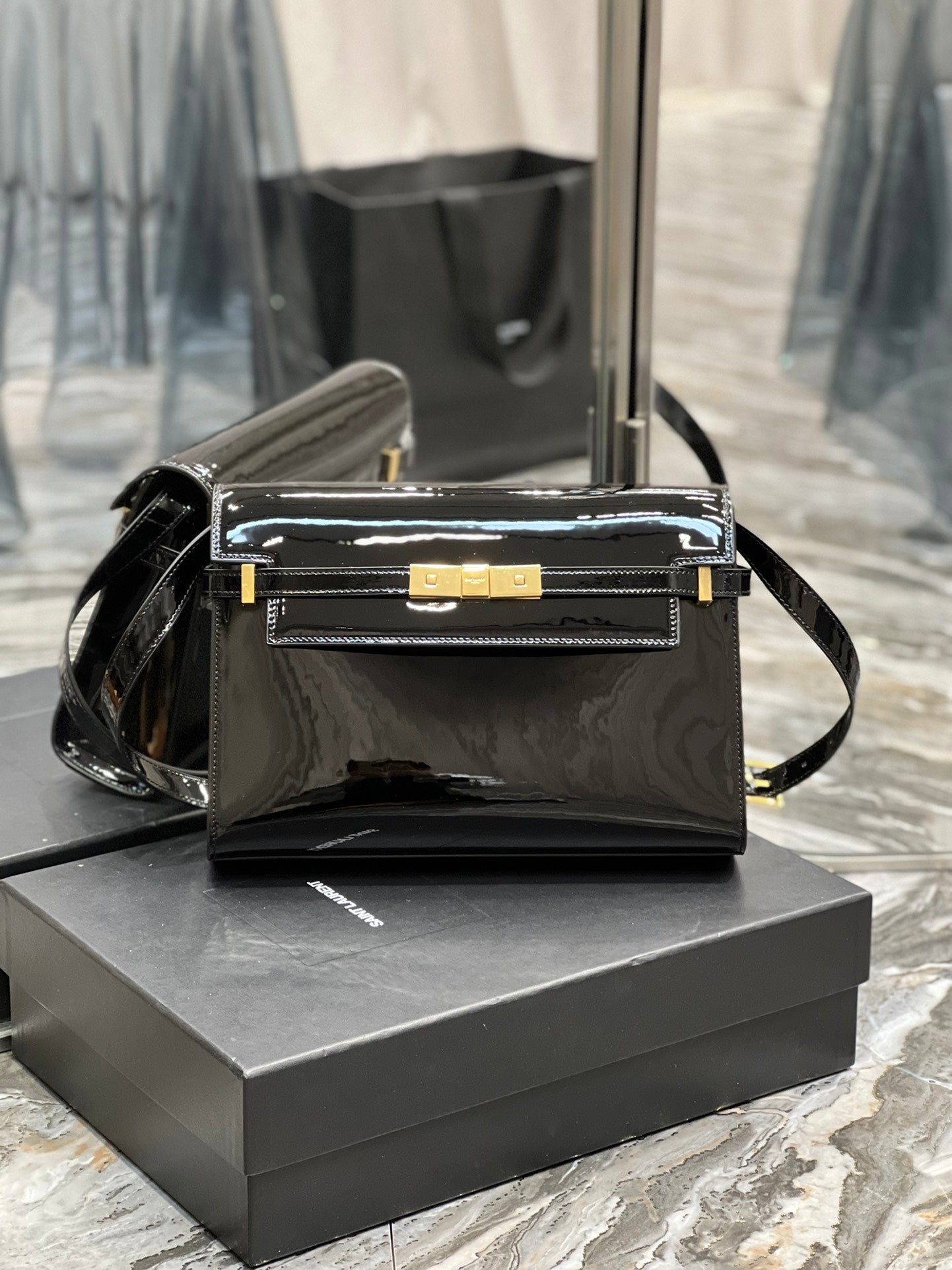 Elegant Black Patent Leather Handbag with Gold Clasp - Luxury Shoulder Bag