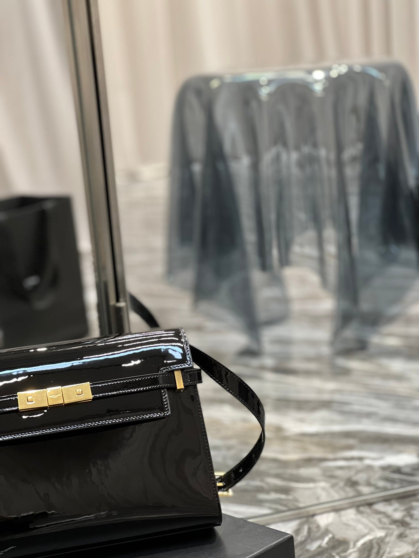 Elegant Black Patent Leather Handbag with Gold Clasp - Luxury Shoulder Bag