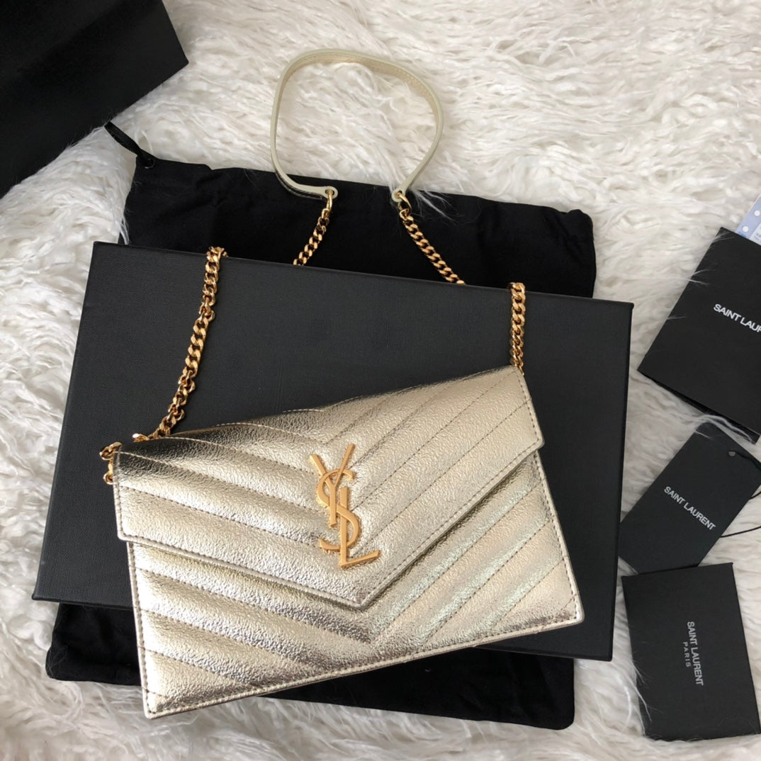 Saint Laurent Cassandre Matelassé Wallet on Chain in Gold Quilted Leather